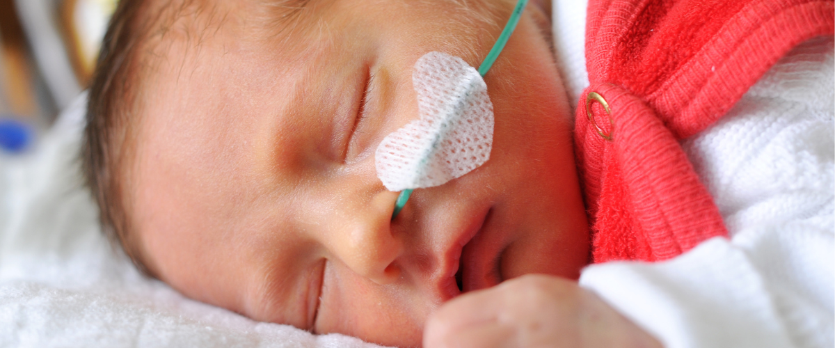 Treating an infant with compassion tech by Covalon